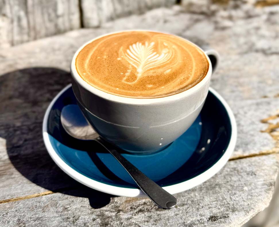 Smith And Local Coffee Locally made shown on a wood table
