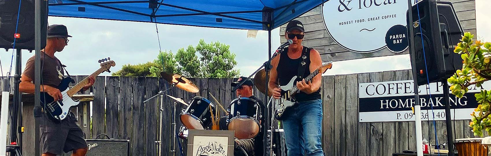 a local rock band is playing an event in front of Smith and Local
